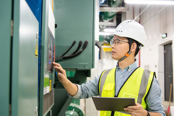 asian male engineer is working on a Cooling system pipeline
