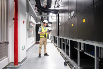  The engineer is in the industrial air conditioned room