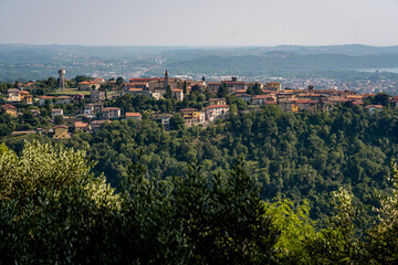 Hilltop Village Of Castelmarte Surrounded By Lush Green Forests: Scenic Countryside Landscape In The Province Of Como, Italy