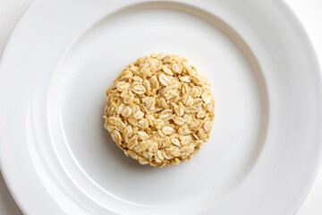Single Oat Cluster Close Up on White Plate oats cookie