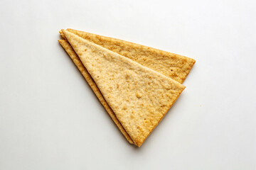 Triangular Wheat Flatbread Two Pieces Folded Beige Background