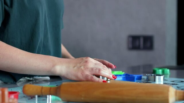 Baking Fun Rolling Out Dough using Colorful Cookie Cutters for Creative Delight and Joy.