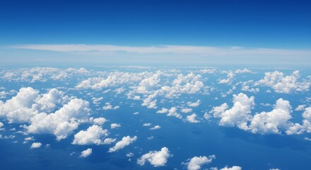Fototapeta premium Aerial View of Fluffy Clouds Over Deep Blue Ocean Waters
