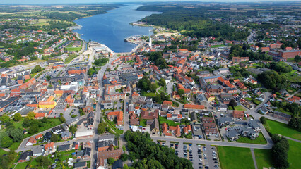 An arial panoramic view of the old town of the city Hobro in Denmark on a sunny spring day