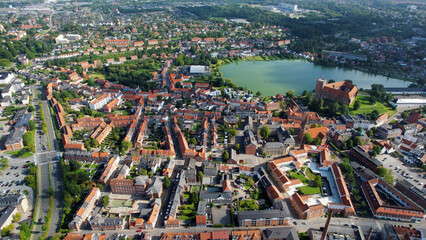 Arial view of the old town of the harbour city Kolding in Denmark on a sunny spring day  
