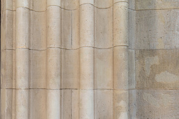 Detail of old stone wall texture with vertical decorative elements. Part of historic architecture in Trebi&scaron;ov, Slovakia.