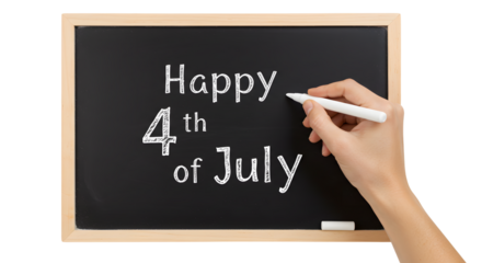 Hand writing Happy Fourth of July on chalkboard with chalk