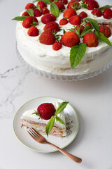 A strawberry and mascarpone cream cake with lemon