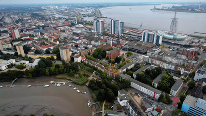 Aerial panorama view above the old town of the city Bremerhaven in Germany on a late afternoon in summer	