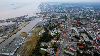 Aerial panorama view above the old town of the city Bremerhaven in Germany on a late afternoon in summer	