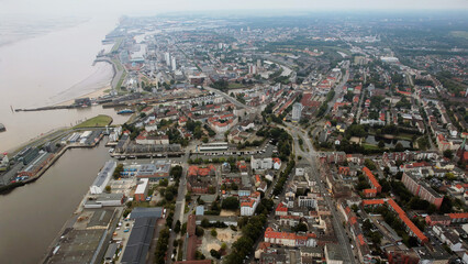 Aerial panorama view above the old town of the city Bremerhaven in Germany on a late afternoon in summer	