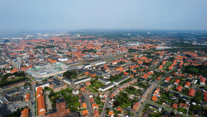 An arial panoramic view of the old town of the harbour city Esbjerg in Denmark on a cloudy spring afternoon