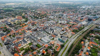 An arial panoramic view of the old town of the city Herning in Denmark on a cloudy spring day