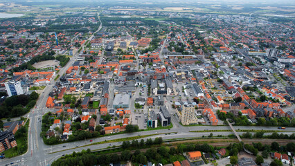 An arial panoramic view of the old town of the city Herning in Denmark on a cloudy spring day