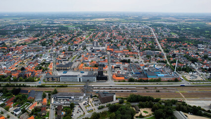 An arial panoramic view of the old town of the city Herning in Denmark on a cloudy spring day