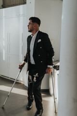 A determined businessman using crutches, showcasing resilience and professionalism in a modern...