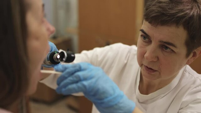 ENT doctor. doctor portrait. Slow motion. High quality 4K video