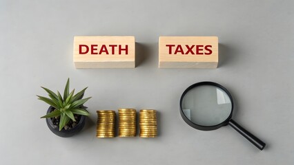 Death taxes concept. Wooden blocks with inscription and coins. Taxes that are applied when someone dies, usually on the money or property they leave behind. 