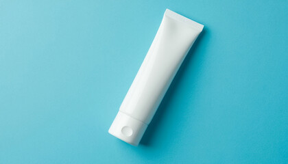 A white tube of mocap on a pastel blue background
