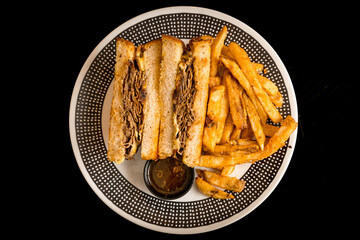 French dip sandwich with French fries