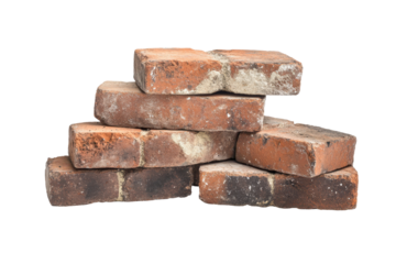 Stacked bricks on a clean white background showcasing their texture and color variations, highlighting the rustic charm of traditional building materials used in construction projects