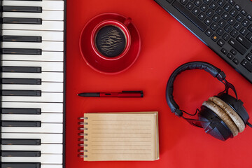 Composition and coffee moment. Musician’s desk with bold color aesthetic.