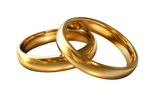 Polished golden wedding rings with a warm glow on a reflective surface enhancing the beauty of commitment and love