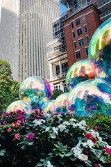 Modern public sculpture in Charlotte city center. Iridescent balloons draw visitors into a fantasy...