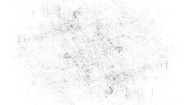 Abstract grayscale texture with scattered particles forming a symmetrical pattern.