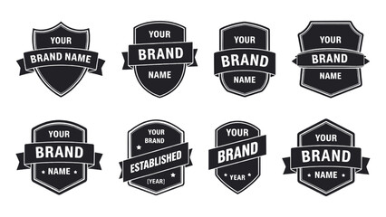 Set of customizable retro-style black shield badge logo templates with ribbons and bold typography perfect for brand identity, product labeling, vintage branding, packaging design, and logo creation