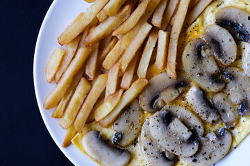 Open Mushroom Omelette With Fried Potato Chips Or Frites