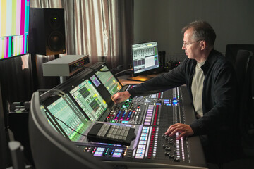 BIMI Operating Professional Video Switcher Console in Broadcast Galary