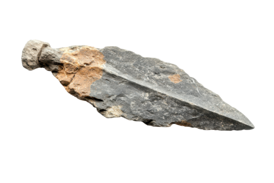 Primitive stone arrowhead discovered with intricate features, showcasing ancient craftsmanship and tools used by early cultures