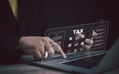 Person using a digital tax application on a holographic interface, symbolizing electronic tax filing, financial data review, compliance checklist, and efficient online tax management system.