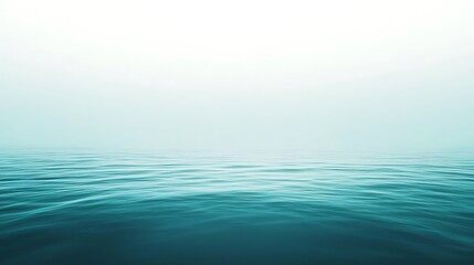 Fototapeta premium Serene ocean view with calm teal water and bright sky horizon for backgrounds and wallpapers