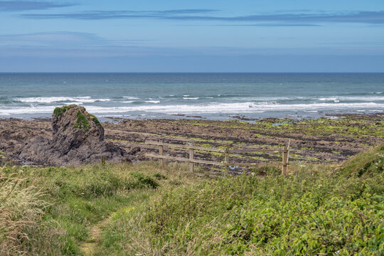 Coastal path view of Black Rock on Widemouth Bay