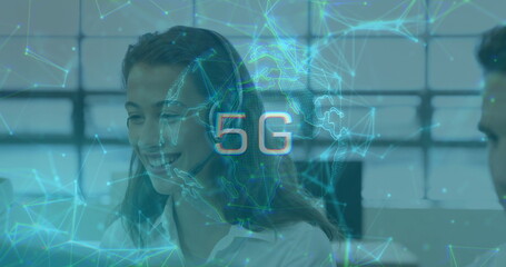 Collaborating office team with woman in white blouse and men studying 5G globe overlay