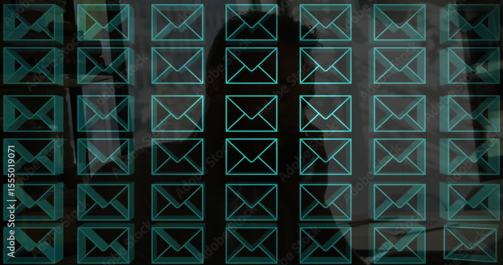 Aufkleber displaying digital message grid projecting over dim office workspace, with turquoise envelope icons
