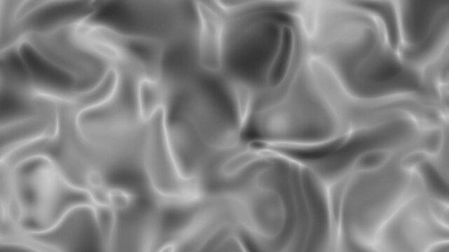 Abstract gray texture with fluid patterns resembling waves and shadows in a soft, artistic background