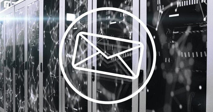 Image of email icon hovering above network servers with digital connections