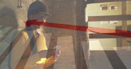 Person in helmet using smartphone with financial graph image overlay