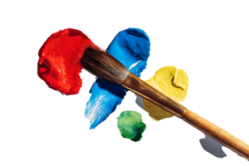 Close up of paintbrush in red, blue, yellow, green paint.
