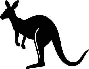 A young adult in a black shirt stands in a lush green field, looking at the camera with a joyful expression