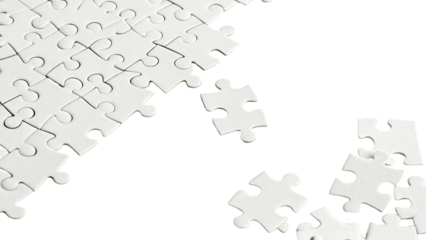 White jigsaw puzzle pieces scattered on black background problem solving concept
