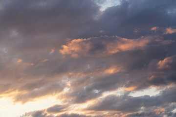 Beautiful orange  sunset sky, with clouds,. Evening sky background.