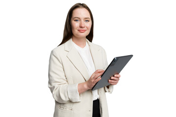 Confident professional woman engaged with a digital tablet while standing against a clean background