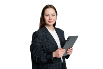 Woman in professional attire confidently holding a tablet while standing against a clean background 