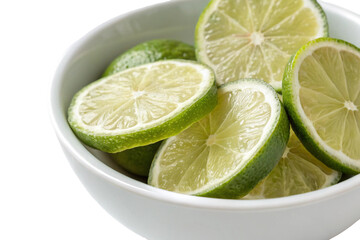 Fresh lime slices in bowl for cocktail garnish and healthy eating lifestyle photo