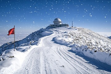 The snow-covered highlands of the Himalayas, with a red flag flying on one side and an observatory