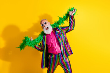 Photo of good mood crazy man wear stylish striped bright suit dance night club theme party isolated...
